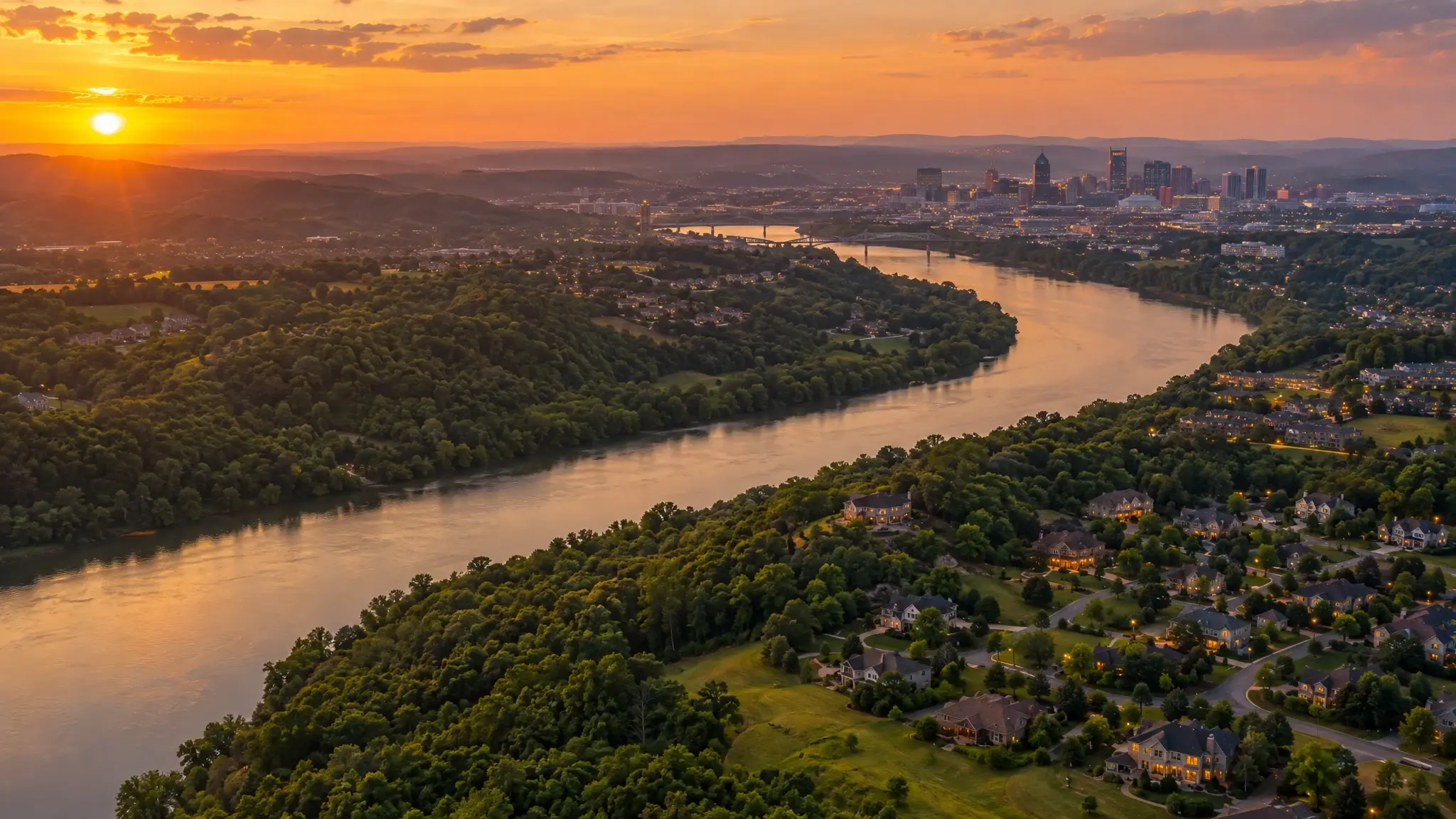 Aerial view of the Cumberland River and Middle Tennessee neighborhoods at sunset